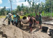 Kodim 0108/Agara Cor Pondasi Tali Sling Jembatan Gantung di Ds. Lawe Ger-Ger, Aceh Tenggara