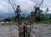 Kodim 0108/Agara Percepat Pemasangan Hanger Jembatan Gantung Perintis di Ds. Teger Miko, Aceh Tenggara 