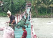 Kodim 0108/Agara dan Warga Tuntaskan Tahap Finishing Jembatan Gantung di Ds. Lawe Beringin, Aceh Tenggara 